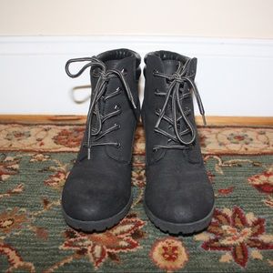 Black lace up booties with a heel